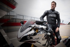 102550-rst-race-dept-v4-1-airbag-one-piece-suit-black-lifestyle-03