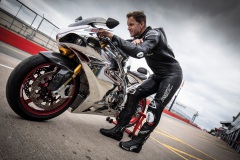 102550-rst-race-dept-v4-1-airbag-one-piece-suit-black-lifestyle-04